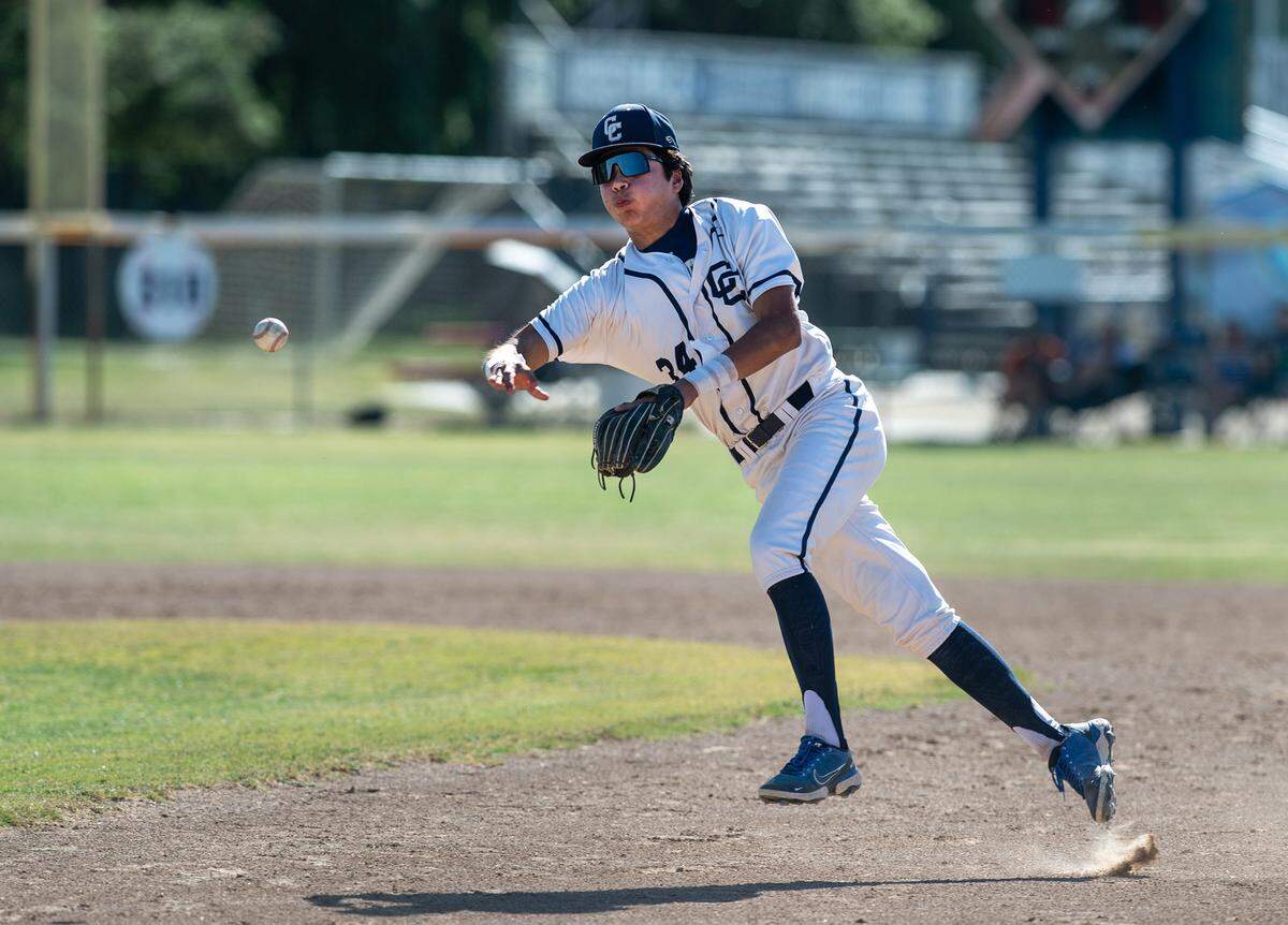 Central Catholic’s Adrian Garcia throw out a Vanden runner during the CIF Sac-Joaquin Section Division III semifinal game at Central Catholic High School in Modesto, Calif., on Wednesday, May 18, 2022. Central won the game 6-1.