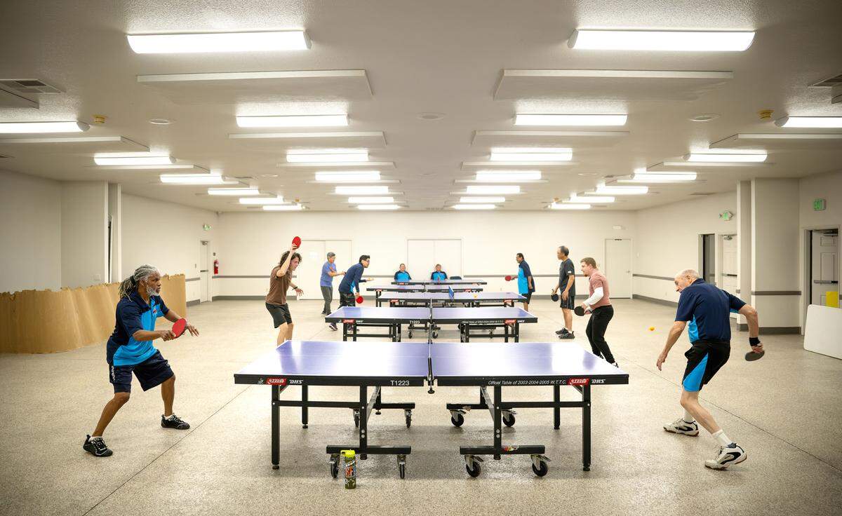 Mike Sturtevant plays a game with Gerald Moore during a meeting of the Modesto Table Tennis club in Hughson, Wednesday, Jan. 15, 2025.