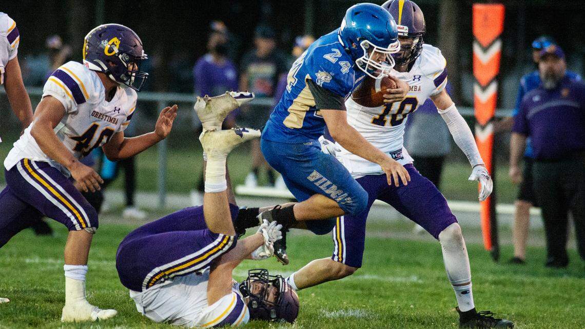 Waterford’s Ryan Hilton runs the ball during the Southern League game with Orestimba in Waterford, Calif., on Friday, April 2, 2021.