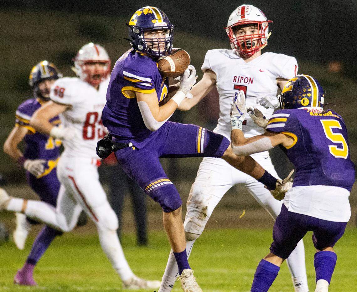 Escalon’s Tyler Medina intercepts a pass during the CIF Sac-Joaquin Division V semifinal game with Ripon in Escalon, Calif., on Friday, Nov. 19, 2021. Escalon won the game 34-10.