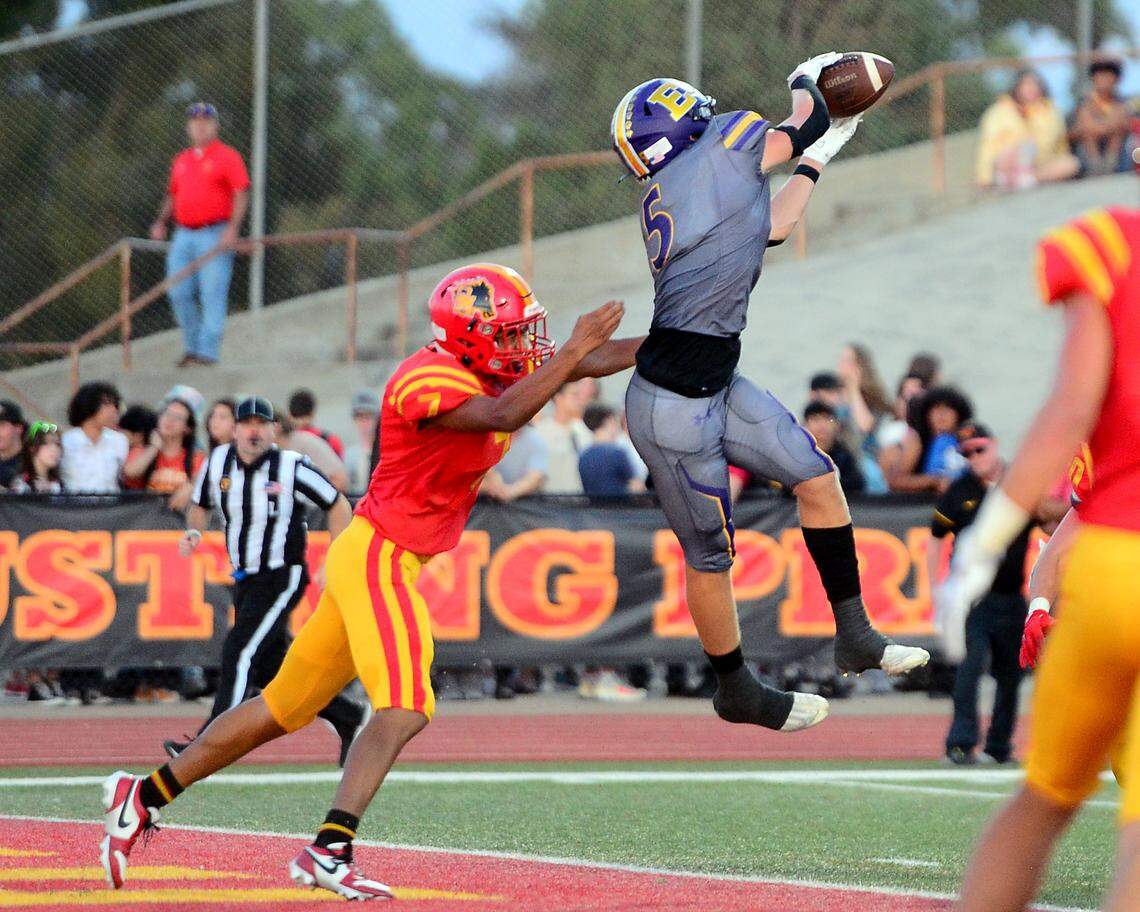 Escalon receiver Sam Jimenez (5) leaps to make a catch during a game between Oakdale and Escalon at Oakdale High School in Oakdale, California, on September 15, 2023.
