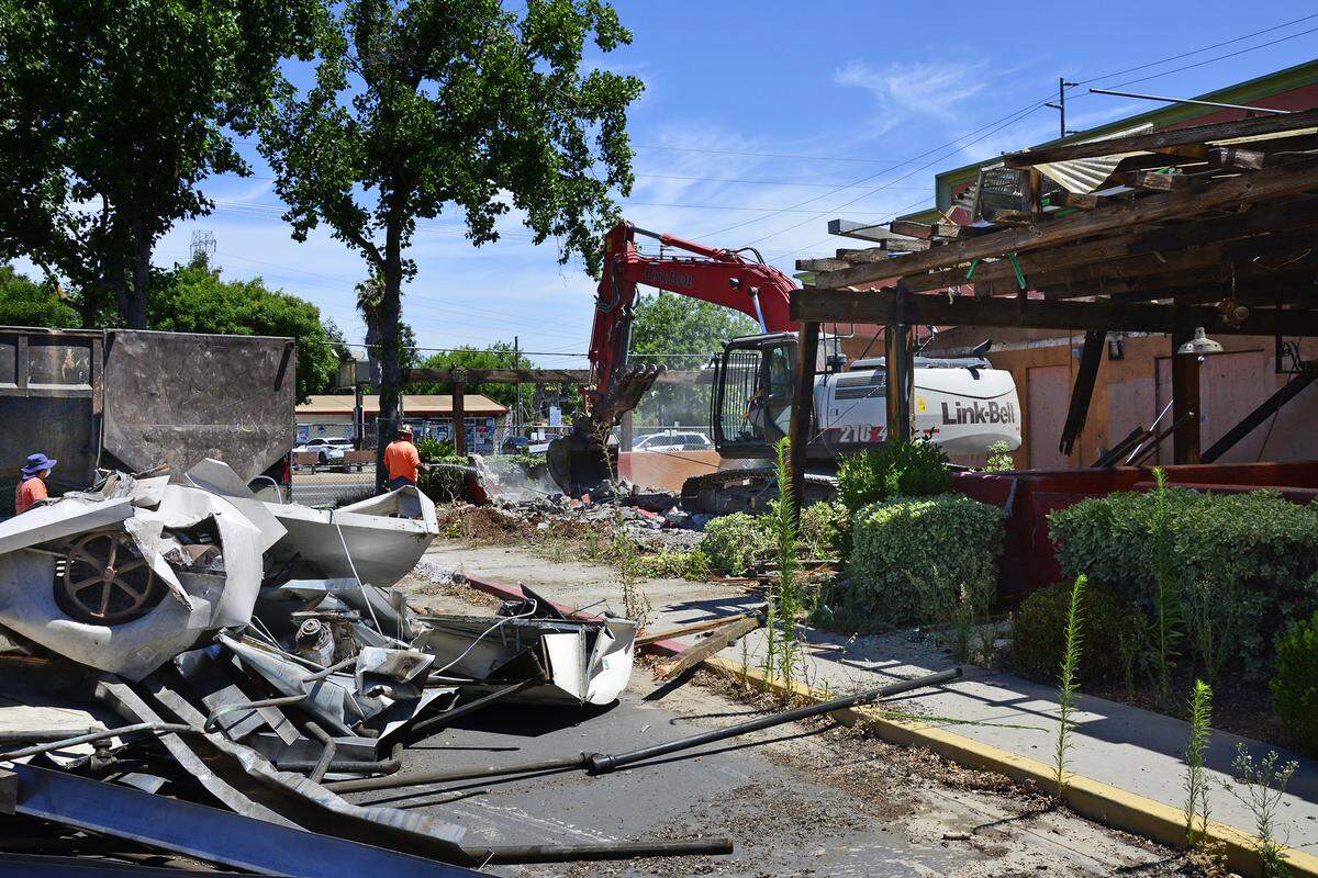 The patio is torn down on the old Chevy’s building to make way for a new dental office in Modesto, Calif. June 27, 2019.