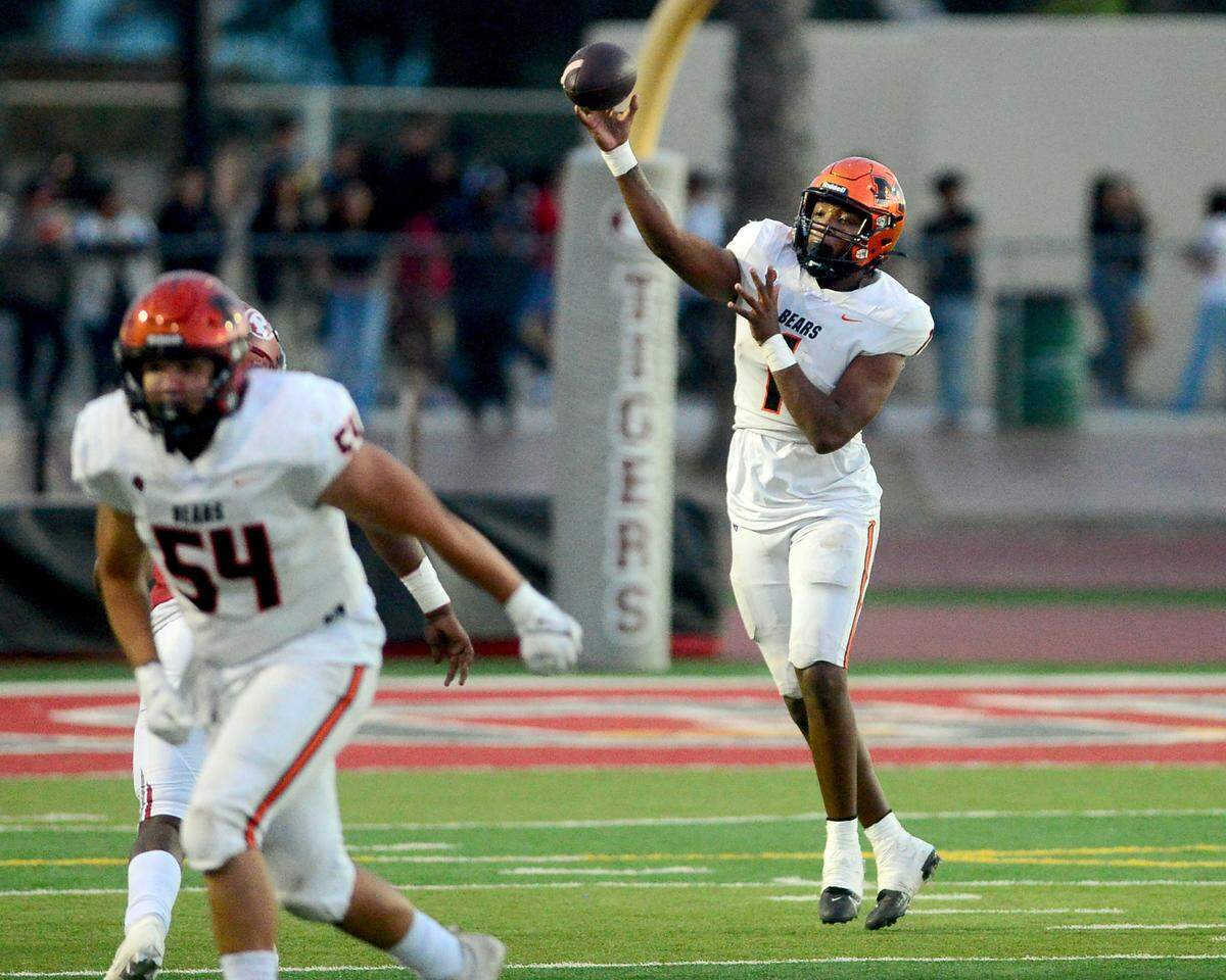 Merced quarterback Quintell Dupree (1) throws a screen pass during a game between Patterson High School and Merced High School at Patterson High School in Patterson California on August 23, 2024.