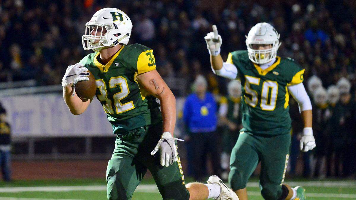 Hilmar senior Justin Rentfro was named to the 2018 MaxPreps Small Schools All-American Football Team after leading his team to a Division VI CIF Sac-Joaquin championship and a CIF State 6-AA Championship. Rentfro is pictured here running into the end zone on November 30, 2018.