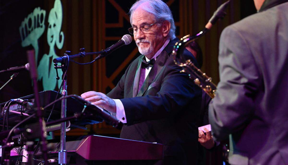 MAMA Lifetime achievement award recipient Dave Dow plays the synthesizer during the Modesto Area Music Association awards show at the State Theatre in Modesto, Tuesday, Oct. 15, 2024.