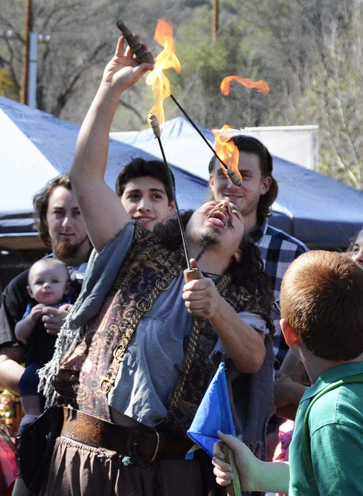 A pyro-juggler performs at the Celtic Faire in 2015.