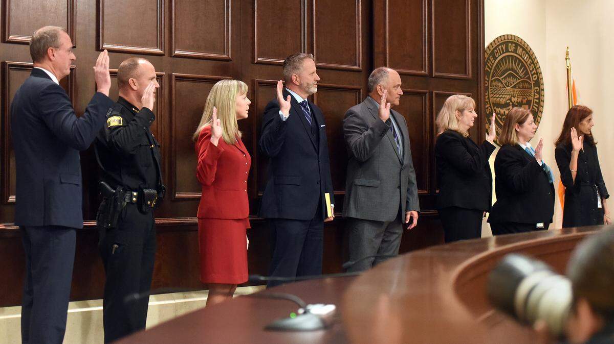 From left to right- Terry Withrow, Jeff Dirkse, Birgit Fladager, Scott Kuykendall, Don H. Gaekle, Donna Linder, Donna Riley and Kashmir Gill take the oath of office on Monday January 7, 2019 during the swearing-in ceremony for the elected county officials on Monday, January 7, 2019 in the basement chambers at the City-County Administration Building at 1010 10th Street in downtown Modesto, Calif.