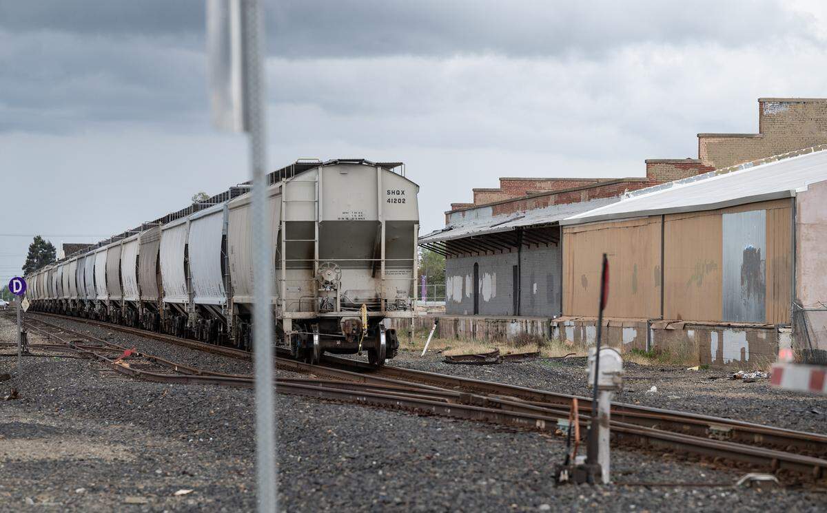 A freight train passes through downtown Turlock north of F Street in Turlock, Calif., on Monday, March 28, 2022.