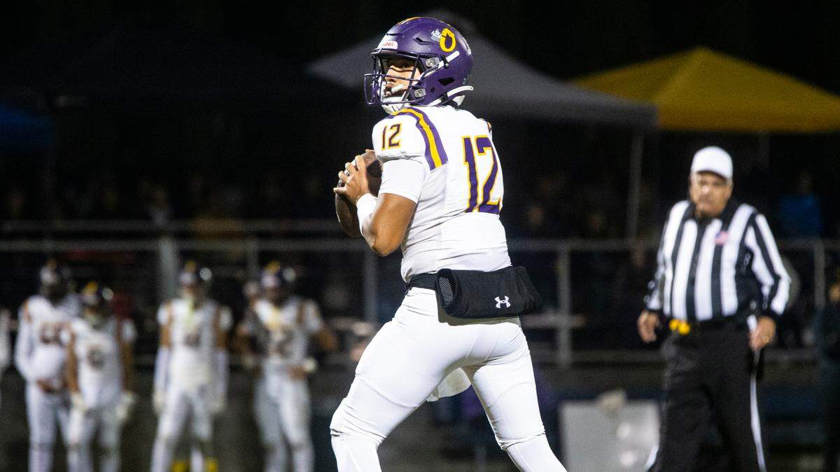 Orestimba quarterback Jacob Valenzuela looks up field for an open man in the Sac-Joaquin Section Division VII-A Championship against Ripon Christian at Ripon Christian High School on Friday, Nov. 17, 2023.