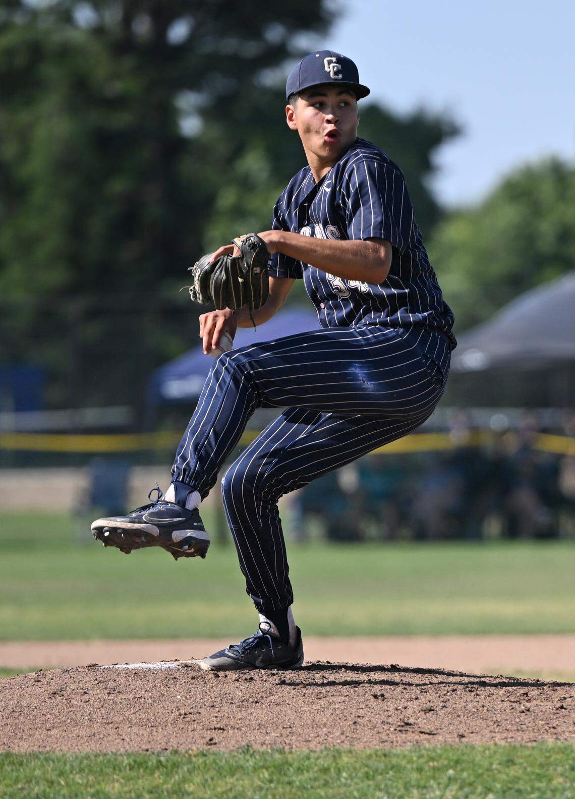 Central Catholic’s Adrian Garcia delivers a pitch during the Northern California Regional Division III championship game with Oakmont at Central Catholic High School in Modesto, Calif., Saturday, June 3, 2023.