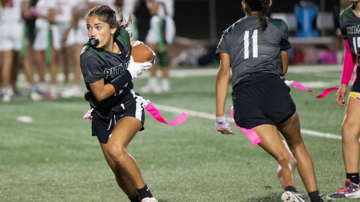 Pitman’s Emily Martinez runs the ball during the the Central California Athletic League game with Modesto at Pitman High School in Turlock, Calif., Monday, Sept. 16, 2024.