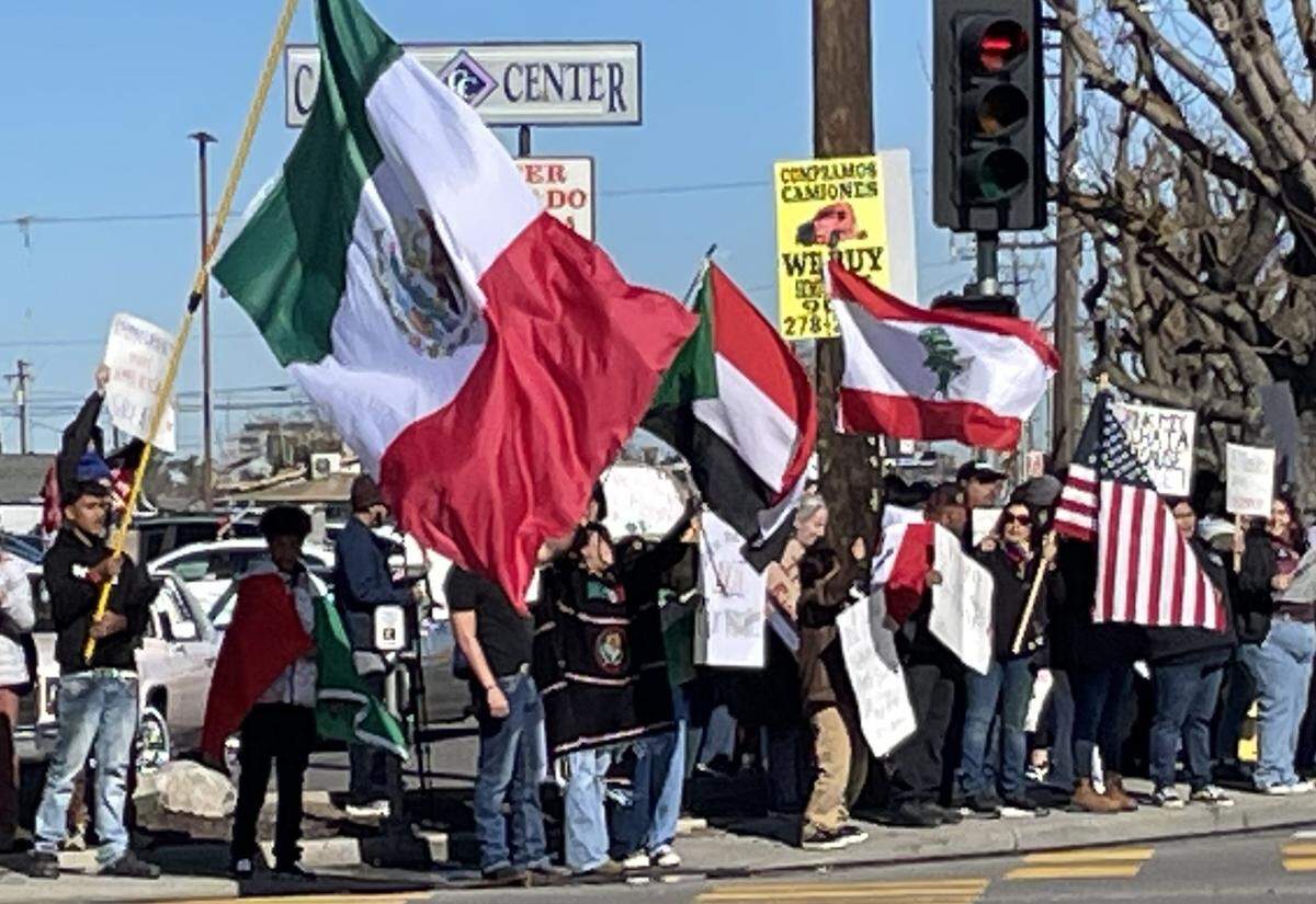 Protesters march against mass deportations on Crows Landing Road in Modesto, Calif., on Feb. 8, 2025.
