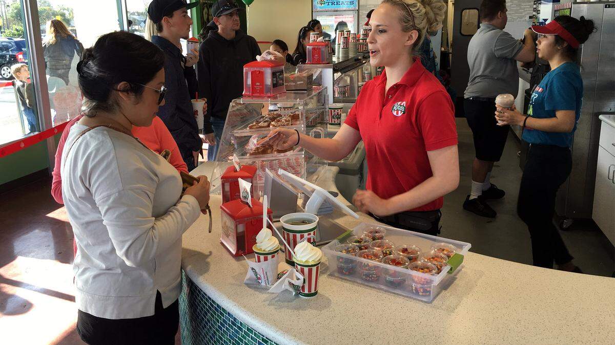In January 2016, store manager Nicole Nathanson helps a customer at the  Rita's Italian Ice on McHenry Avenue in Modesto.