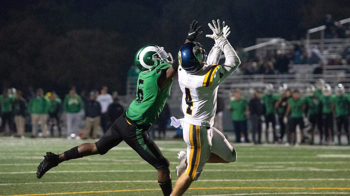 Turlock’s Peter Mello makes touchdown catch past St. Mary’s Joshua Watkins in the final two minutes of the CIF Sac-Joaquin Section Division 1 playoff game at St. Marys High School in Stockton, Calif., Friday, Nov.11, 2022. After Mello’s touchdown Turlock scored a two-point conversion to go ahead and win the game 51-50.