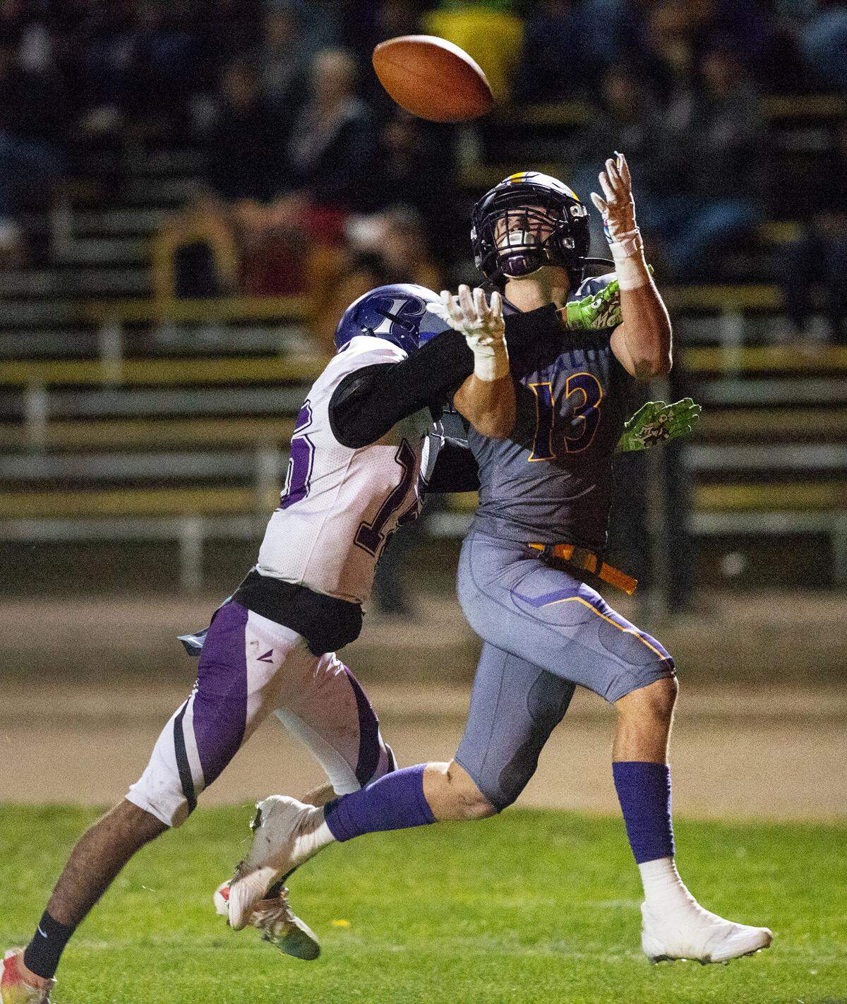Escalon’s Owen Nash makes a touchdown catch as Pacheco’s Daniel Scott defends during the first round playoff game in Escalon, Calif., Friday, Nov. 4, 2022. Escalon won the game 55-0.