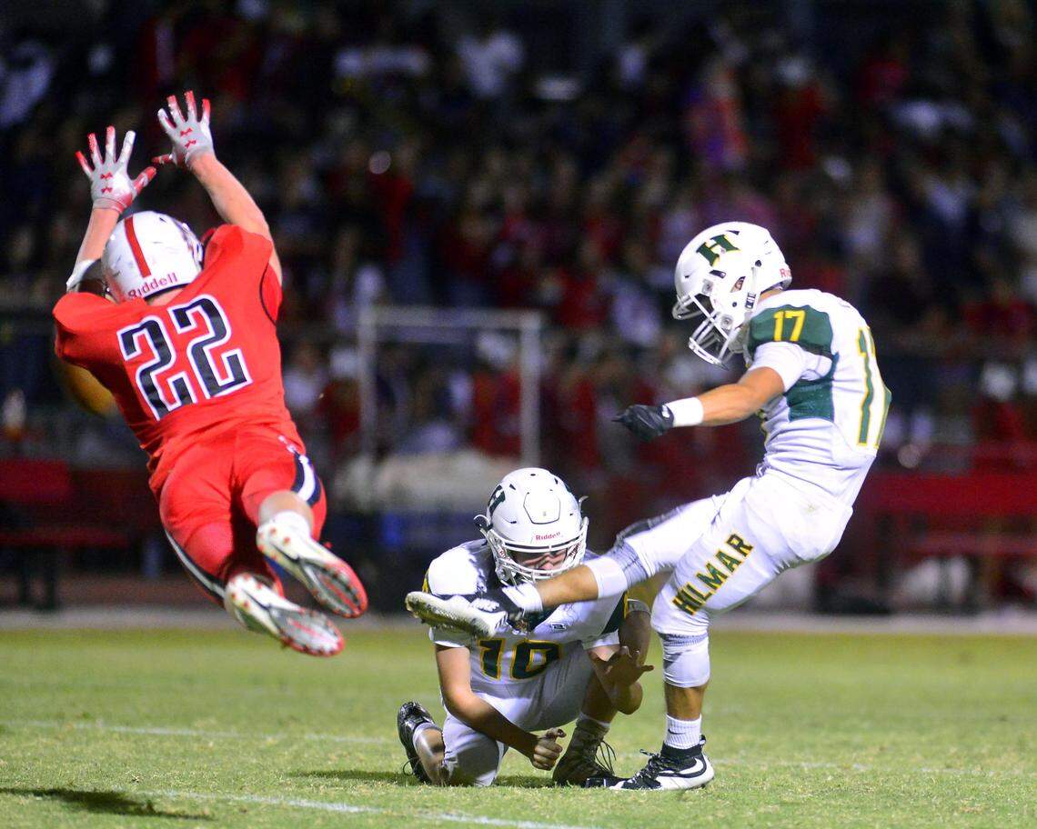 Ripon’s Grant Wiebe (22) blocks a field goal attempt by Hilmar’s Bryan Milan (17) during a game between Ripon and Hilmar at Ripon High School in Ripon CA on September 14, 2018.