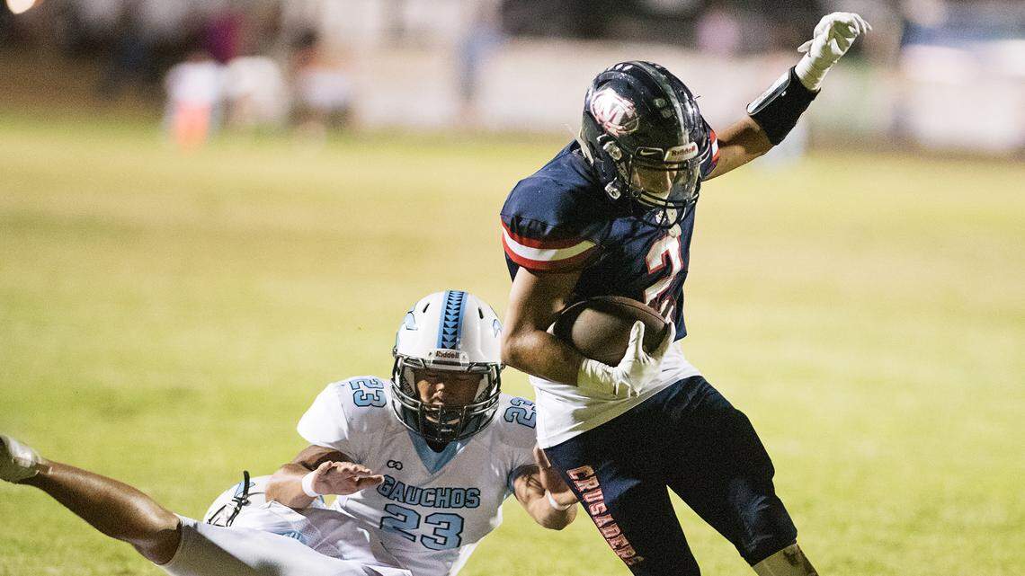 Modesto Christian’s Jose Hernandez scores a touchdown during the non-league game with El Capitan in Salida, Calif., on Friday, September 7, 2018. Modesto Christian won the game 47-8.