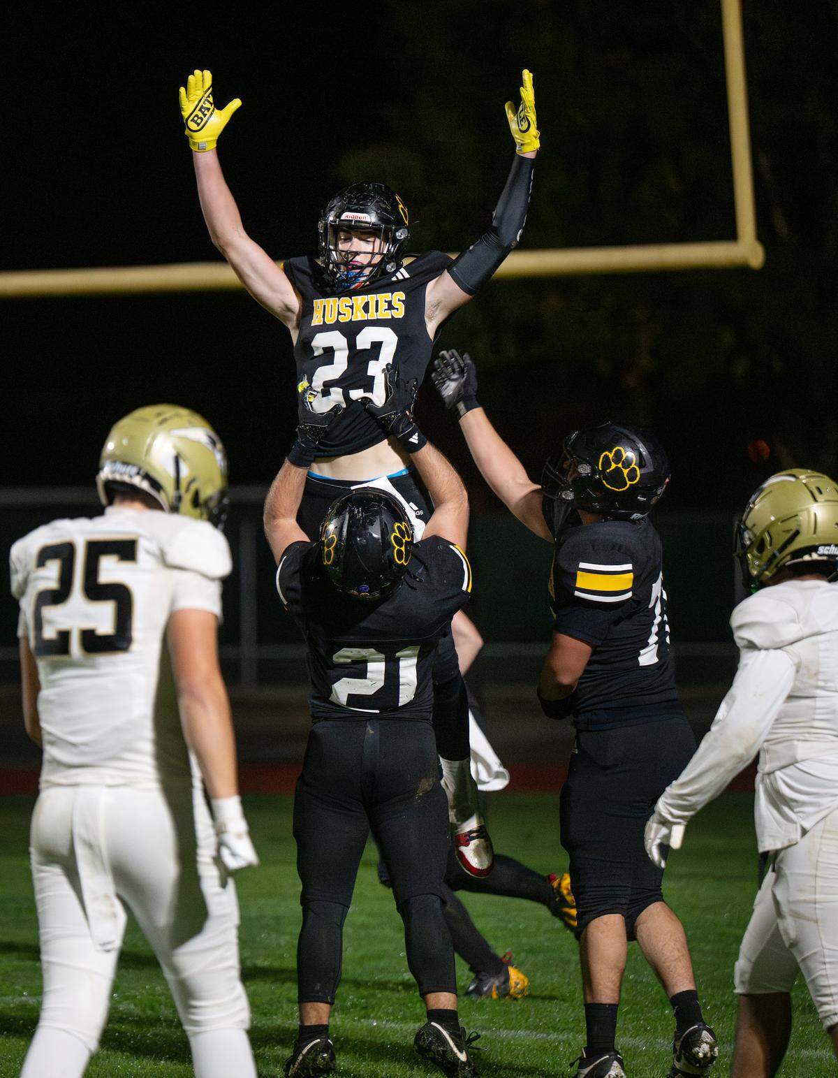 Hughson’s Titus Beers and Eli Wilbanks celebrate a first-half touchdown during the Sac-Joaquin Section D-IV playoff game with Pioneer In Hughson on Friday, Nov. 14, 2025.