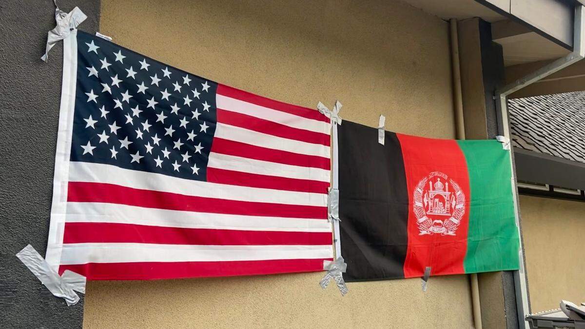 Flags for the United States and Afghanistan hang next to each other at an Aug. 19, 2021, town hall for Modesto Afghans seeking to rescue loved ones after the Taliban took over Afghanistan earlier this month.