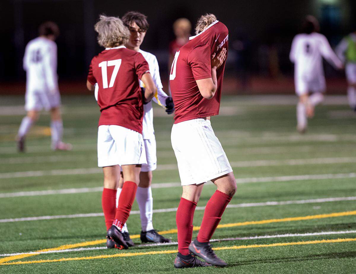 Patterson’s Luis Maravilla, right, reacts 2-0 loss to Vista del Lago in the the Sac-Joaquin Section Division III title game at Turlock High School in Turlock, Calif., on Tuesday, Feb. 22, 2022. Vista del Lago (Folsom) won the championship 2-0.
