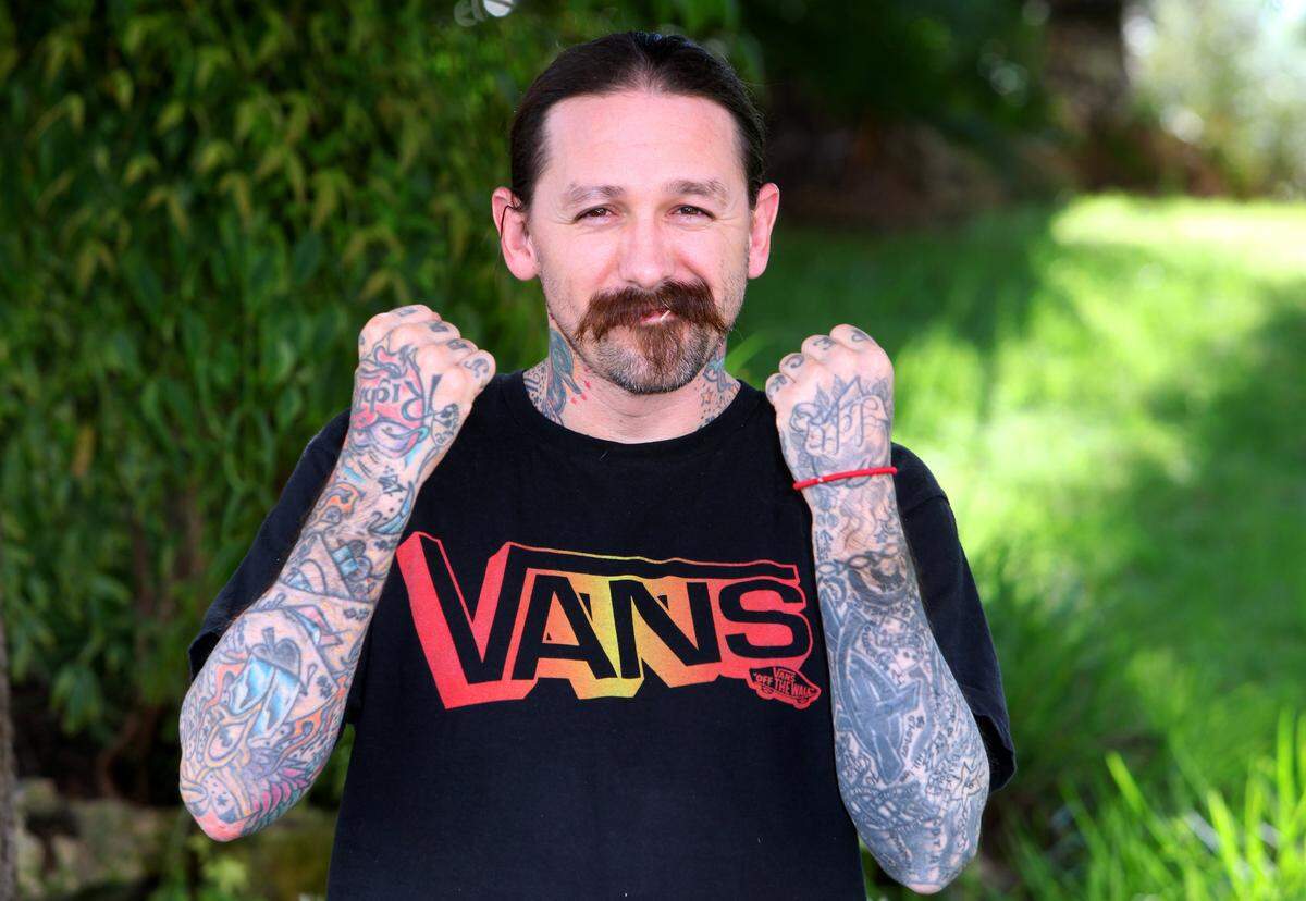 Oliver Peck, a  tattoo artist from Dallas, poses on Oct. 3, 2011, in Cannes, southern France, during the international MIPCOM audiovisual trade show.