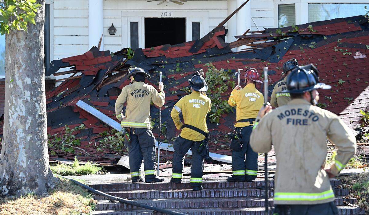 Fire crews contained a blaze at the former Franklin and Downs Funeral Homes building at 12th and G streets in Modesto, Calif., Tuesday, July 16, 2024.