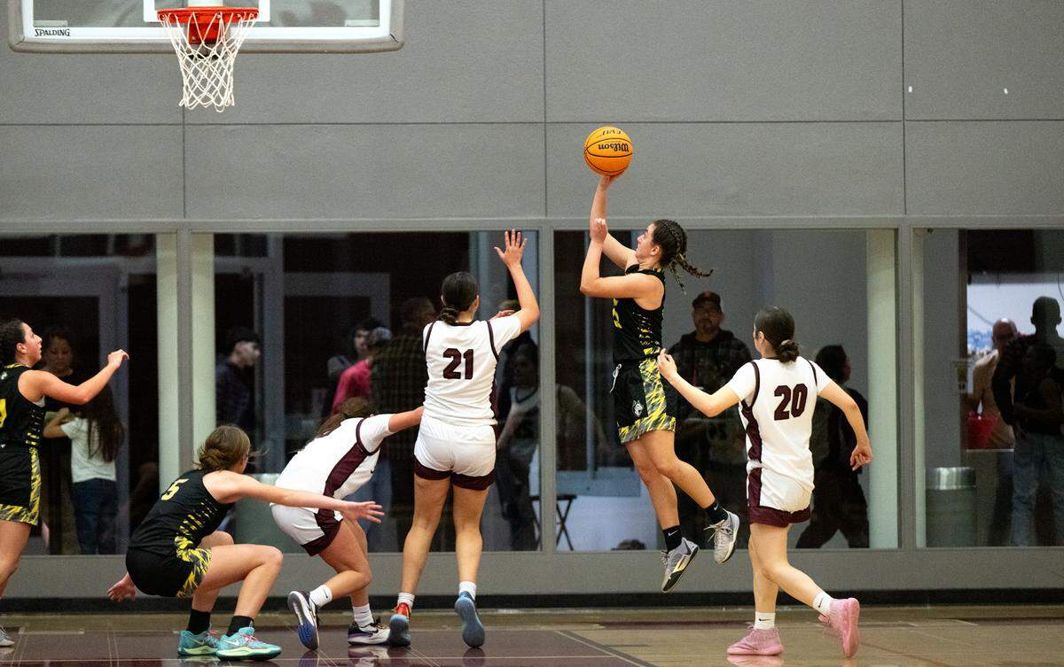 Hughson’s Peyton Avila puts up a jump shot during a non-league game with Riverbank in Riverbank, Tuesday, Dec. 3, 2024.