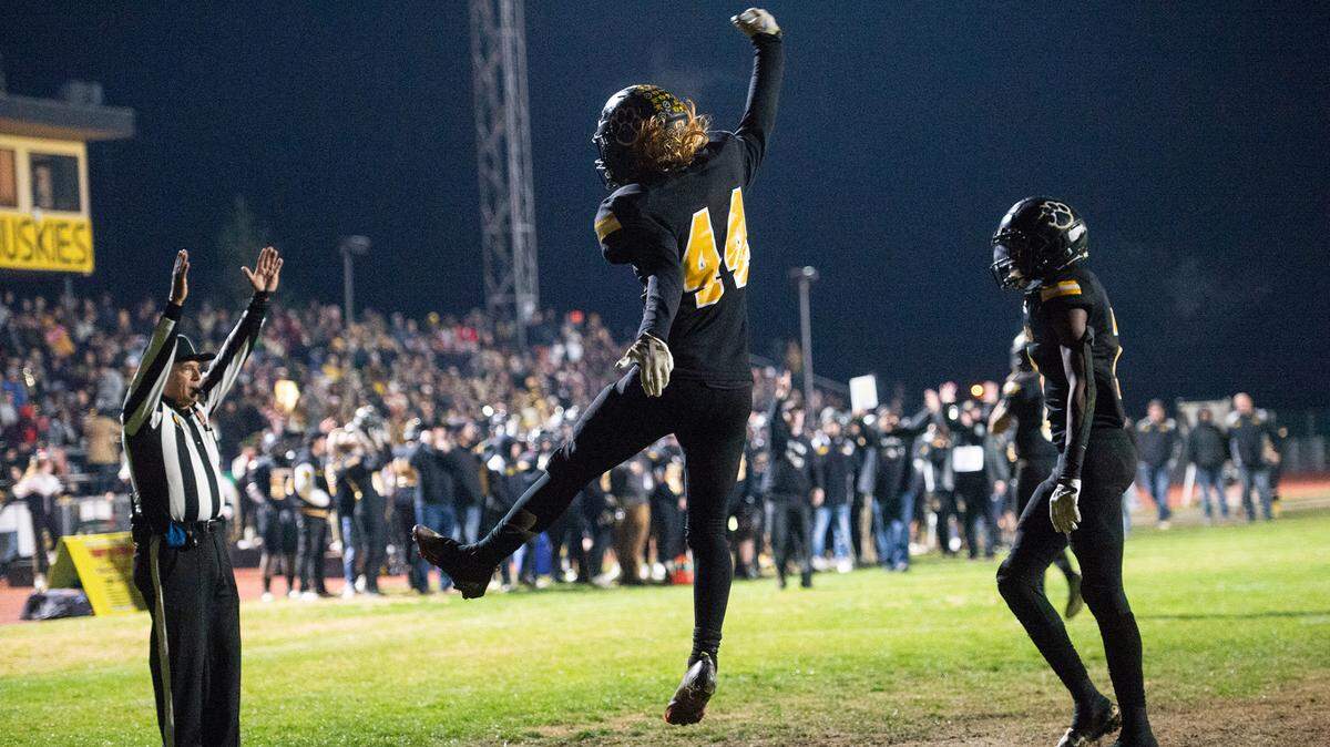 Hughson’s Liam Bridgford celebrates a rushing touchdown during the CIF State Northern California Division 5-AA championship game with Ripon Christian in Hughson, Calif., Friday, Dec. 2, 2022. Hughson won the game 31-28.