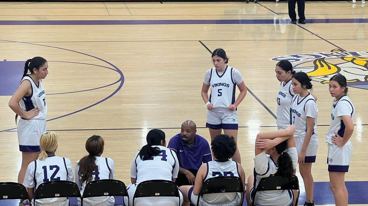 Johansen High girls basketball coach Derrick McLaughlin talks to his team in a timeout during the Vikings’ 58-39 WAC win over Beyer on Tuesday, Jan. 17, 2023.