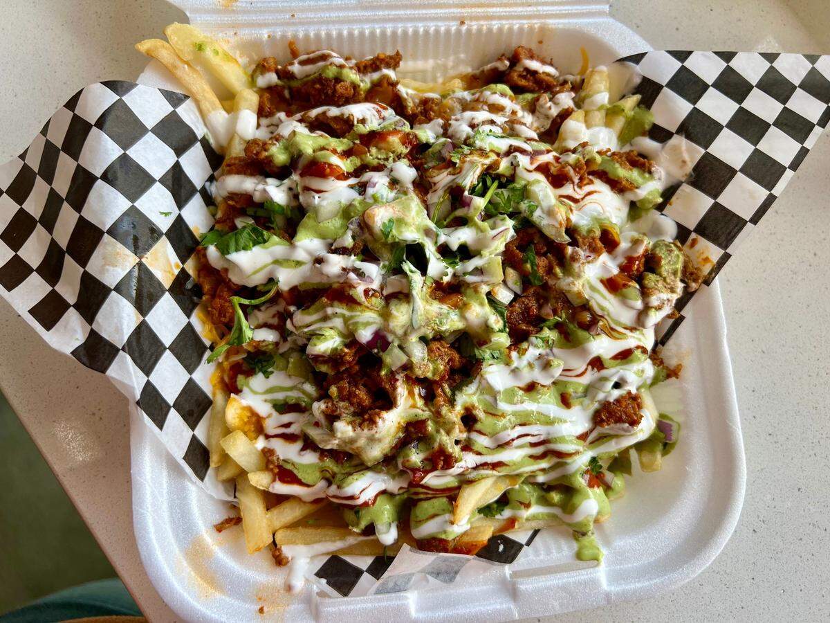 Taquilero fries with pastor from Taquileros Taquería in Salida