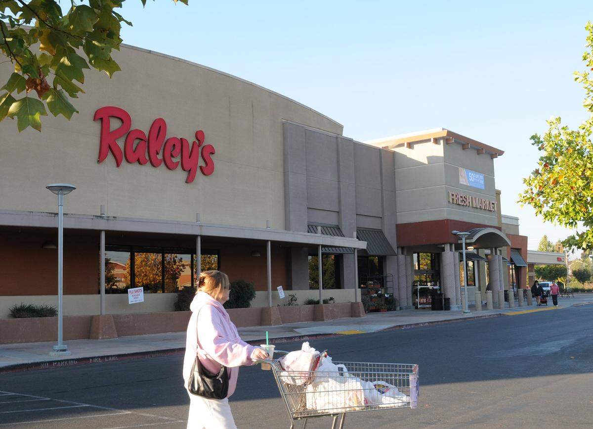 A shopper leaves Raley’s in Village One Plaza on Tuesday morning (10-30-12) in Modesto, Ca. in this Bee file photo. 