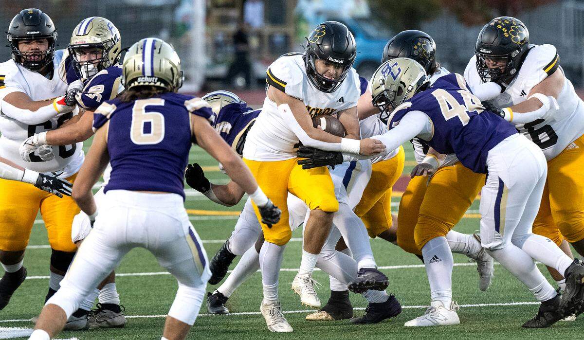 Hughson’s Alexander Villarreal runs the ball during the Sac-Joaquin Section Division VI championship game with Bradshaw Christian at Sacramento City College in Sacramento, Calif., Saturday, Nov. 25, 2023.