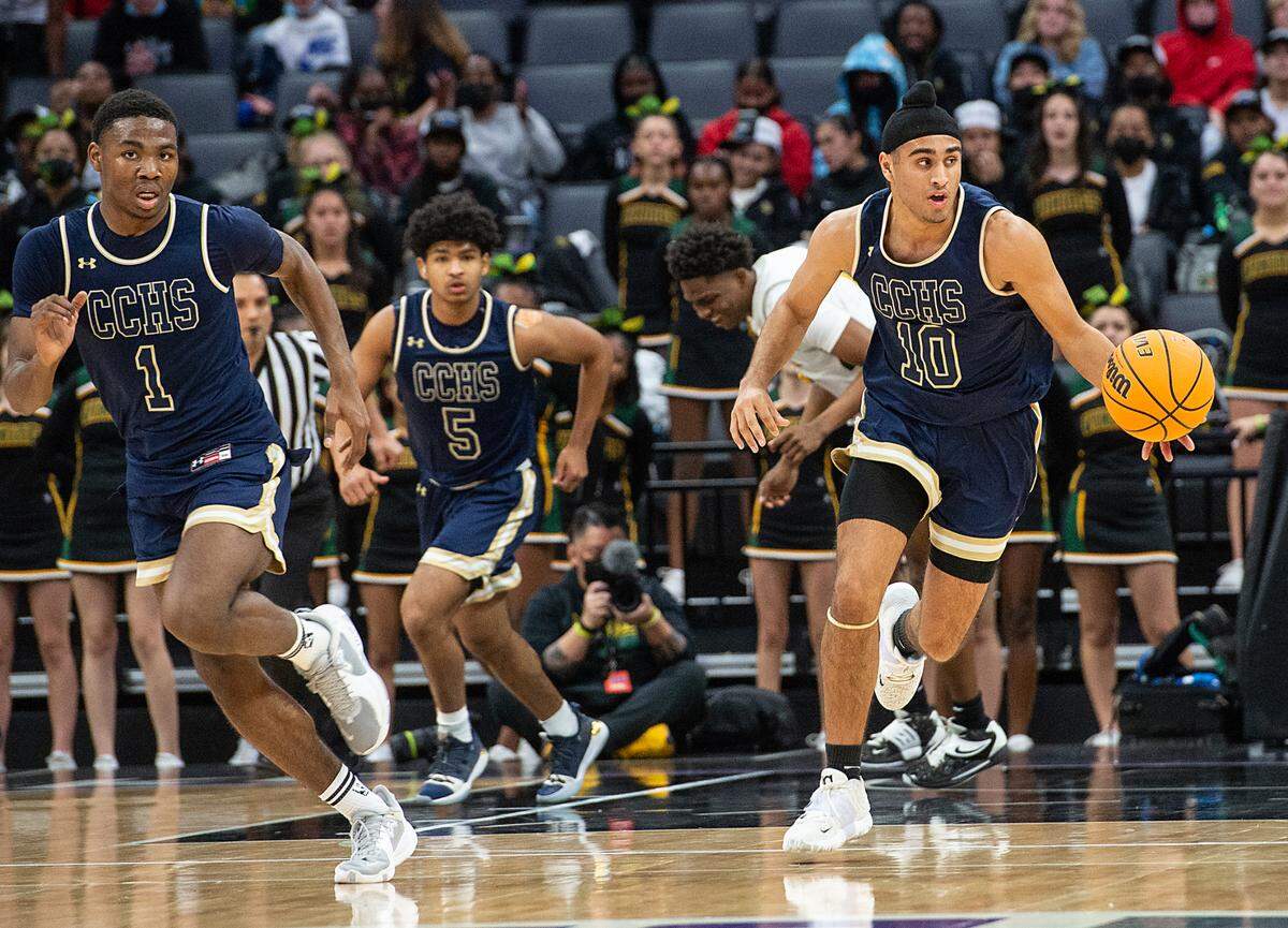Central Catholic’s Armaan Grewal takes the ball up the court in the boys Sac-Joaquin Section Division 3 final with Vanden at the Golden 1 Center in Sacramento, Calif., on Saturday, Feb. 26, 2022.