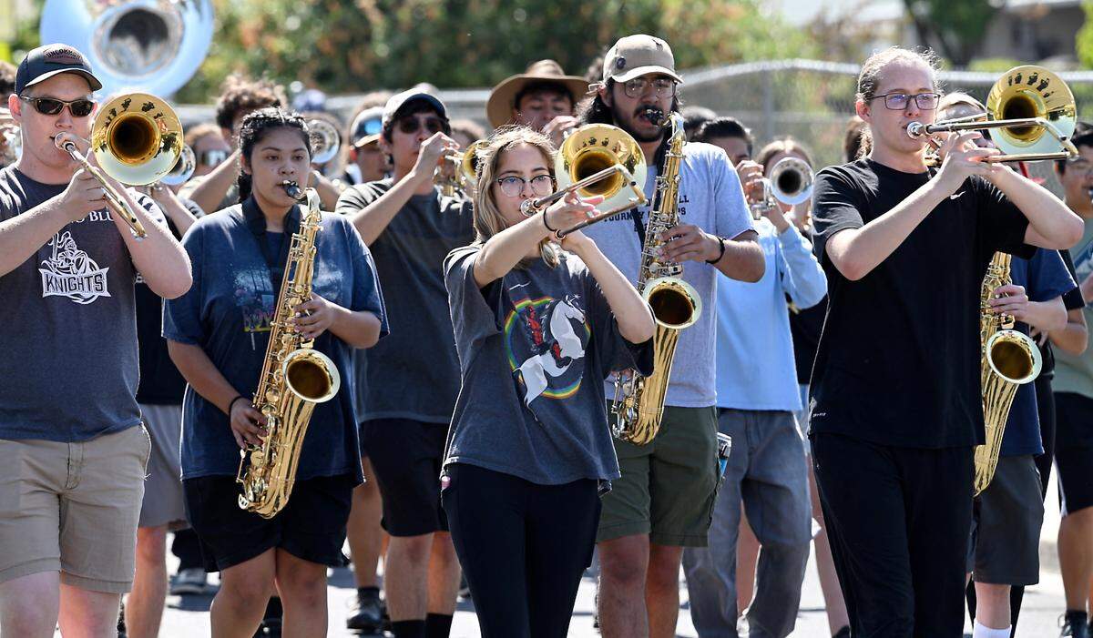 Students in the Modesto City Marching Brigade rehearse behind Beyer High School in Modesto, Calif., Wednesday June 28, 2023. 130 students from seven Modesto City High schools form the band, which is headed to Washington D.C to perform in the Independence Day parade.