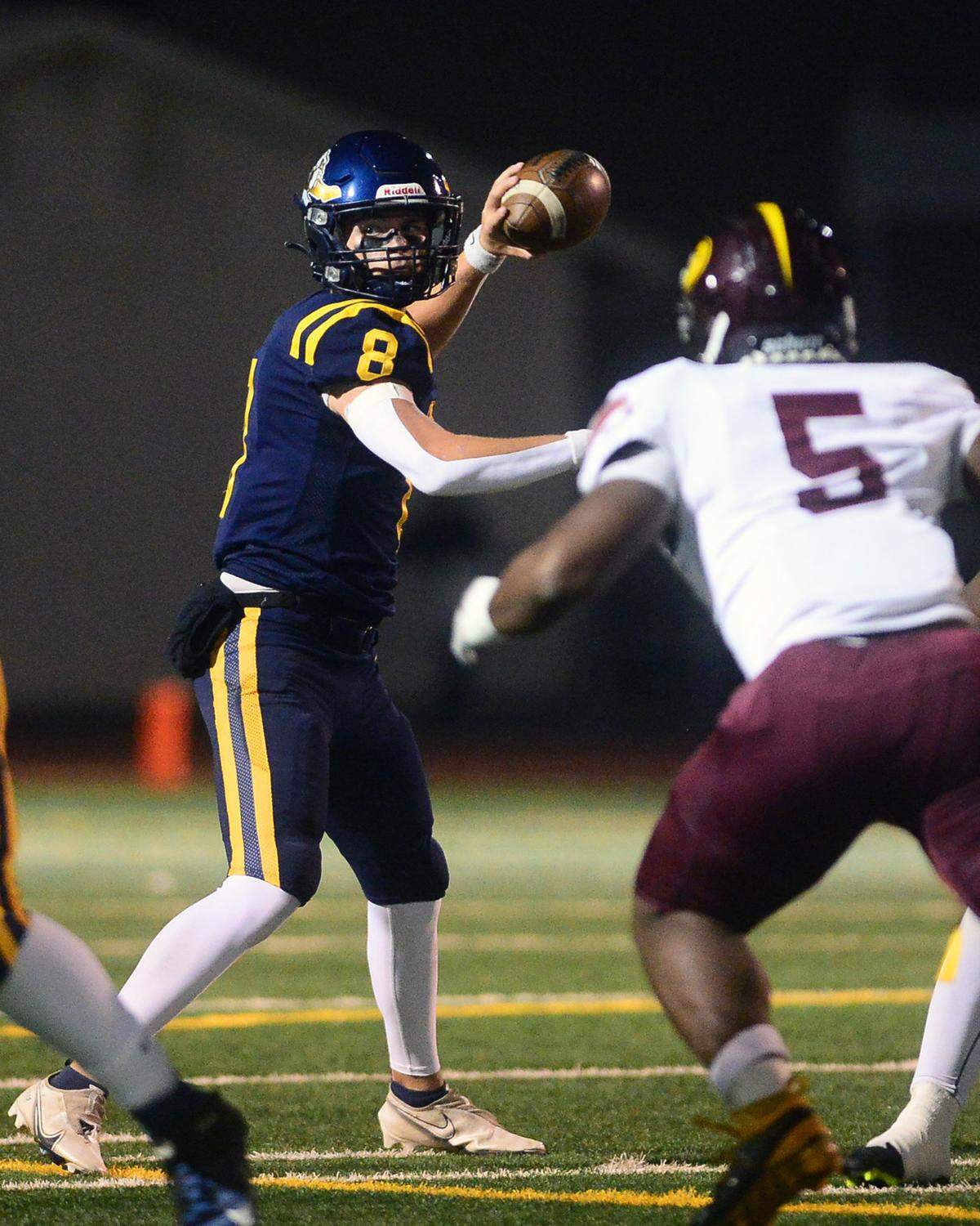 Turlock quarterback Cole Gilbert (8) throws the ball to the flat during a CIF Division I CIF Sac-Joaquin Section Football Playoff game between Turlock High School and Edison High School at Turlock High School in Turlock CA on November 4, 2022. Turlock won 35-0.
