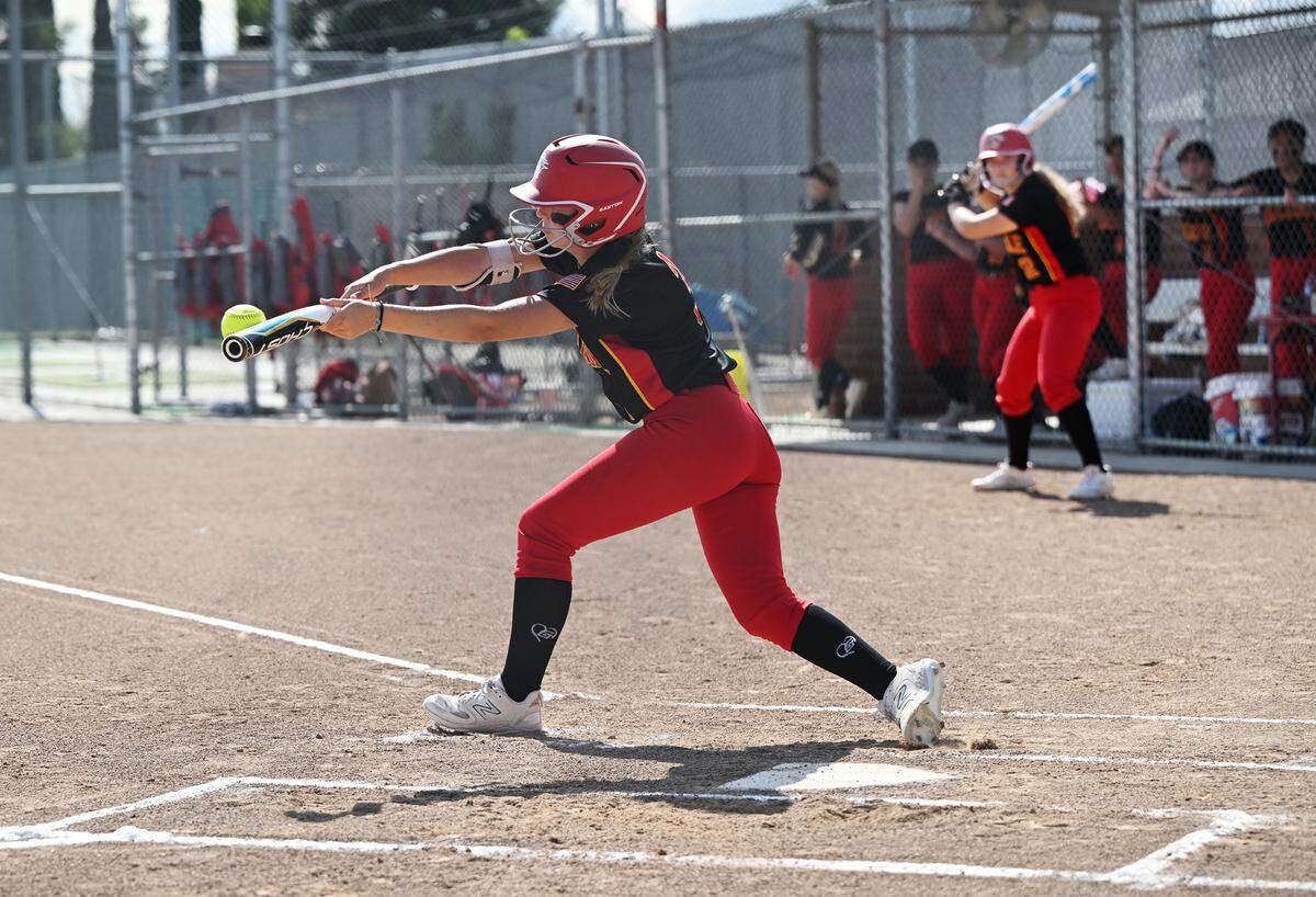 Oakdale’s Briley Everett bunts the ball during the Valley Oak League game with Kimball in Oakdale, Calif., Thursday, May 4, 2023.