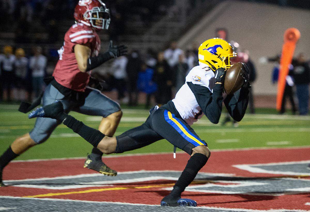Grant’s Kenyon Shabazz makes a touchdown catch during a Sac-Joaquin Section Division III semifinal with Patterson in Patterson, Calif., Friday, Nov. 18, 2022. Grant won 80-44.
