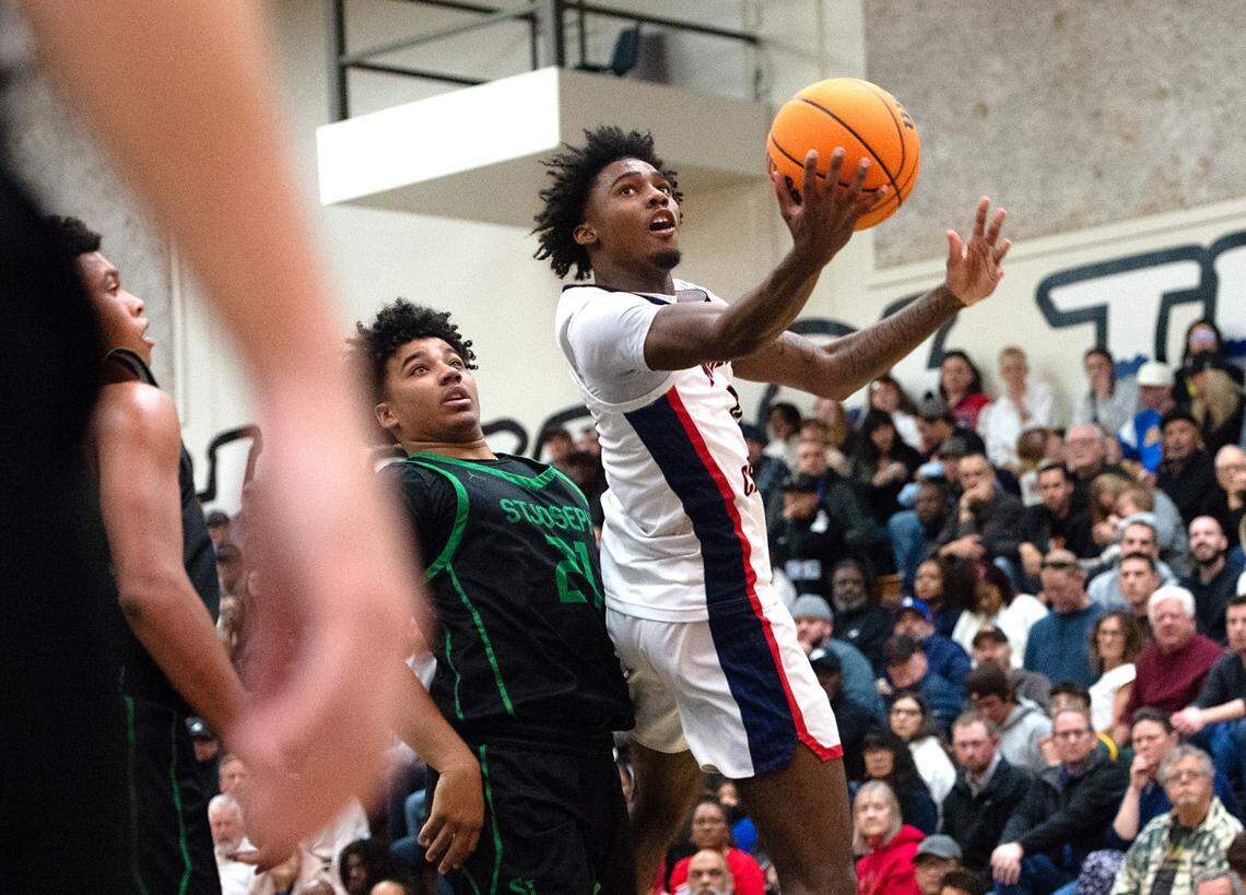 Modesto Christian’s Jalen Brown scores on a layup during the NorCal Open Division championship game with St. Joseph at Modesto Junior College in Modesto, Calif., Tuesday, March 7, 2023.
