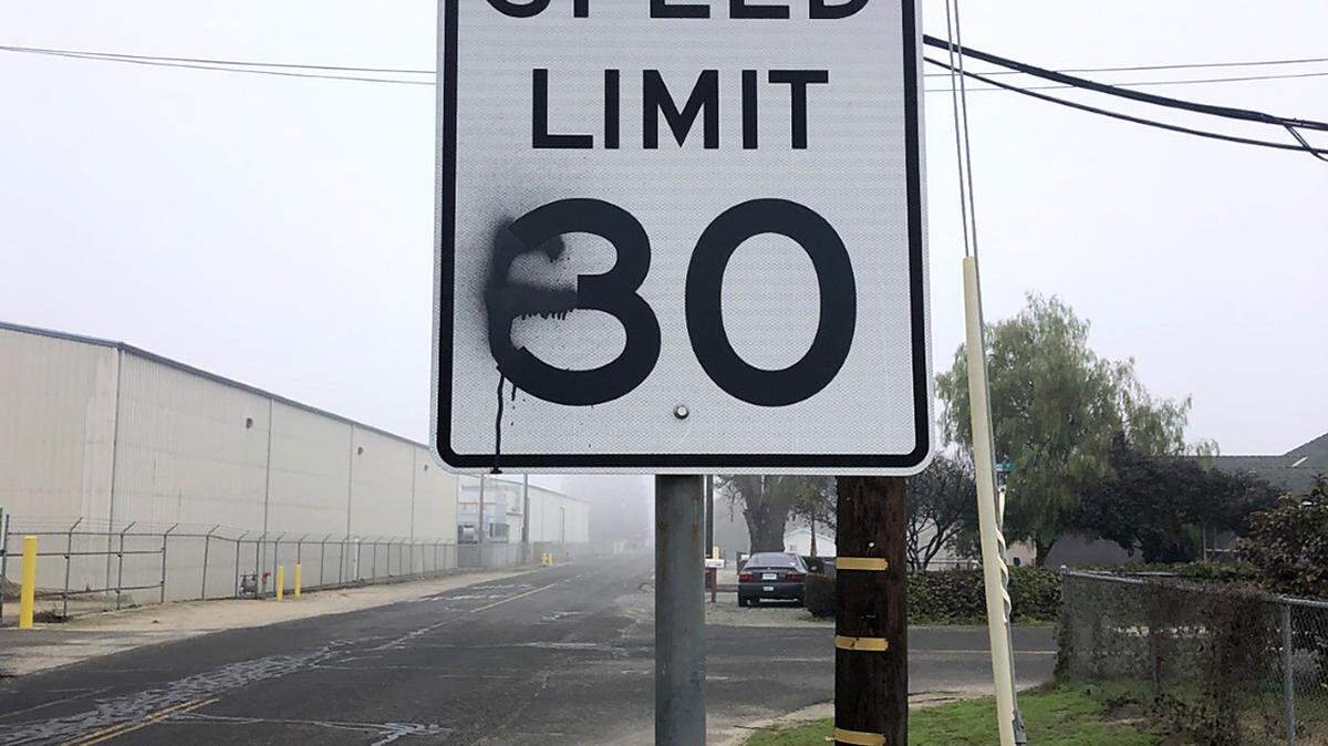 Two men were seen spray painting a dumpster and road sign after allegedly attempting to rob a man with BB guns in Hughson on Monday.