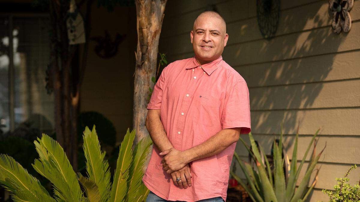 Joaquin Sotelo outside his home in Newman, Calif., on Friday, Aug. 27, 2021.