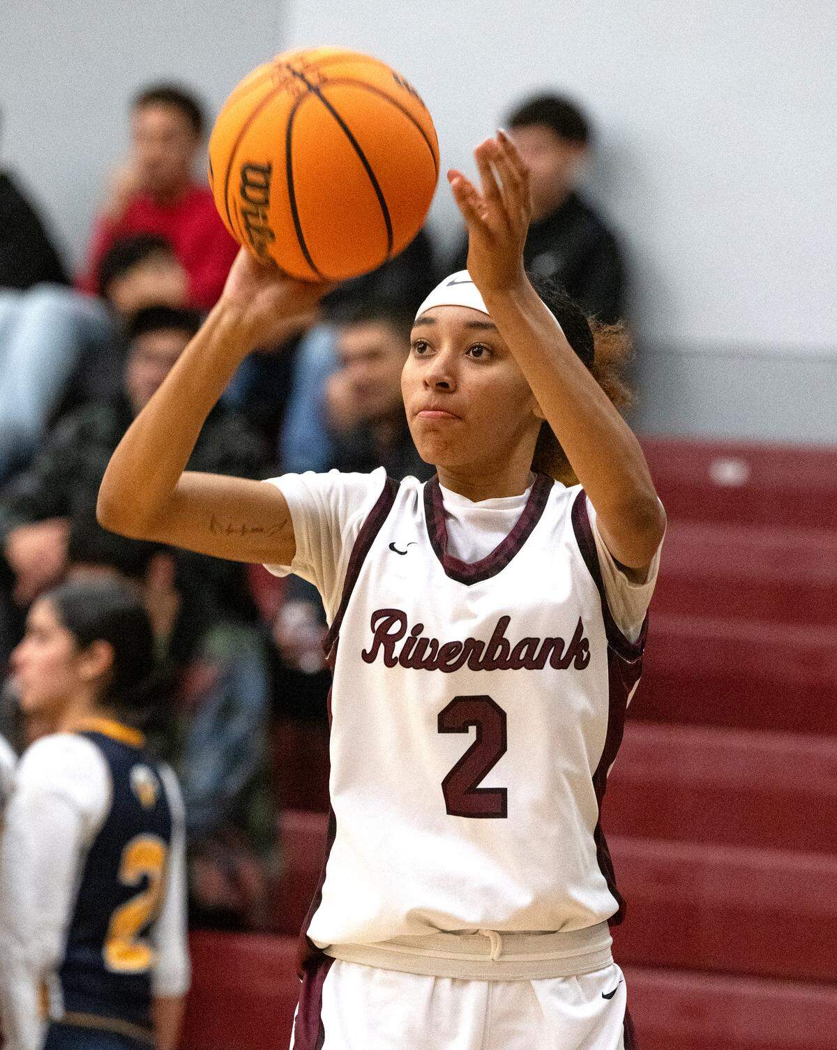 Riverbank’s Taylor Macias shoots a three pointer during the non-league game with Hughson in Riverbank, Tuesday, Dec. 3, 2024.