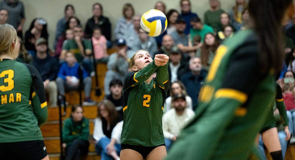 Hilmar’s Sophie Stivers sets the ball during the CIF Northern California Division IV volleyball championship match with St. Patrick-St.-Vincent of Vallejo at Hilmar High School in Hilmar, Tuesday, Nov. 19, 2024.
