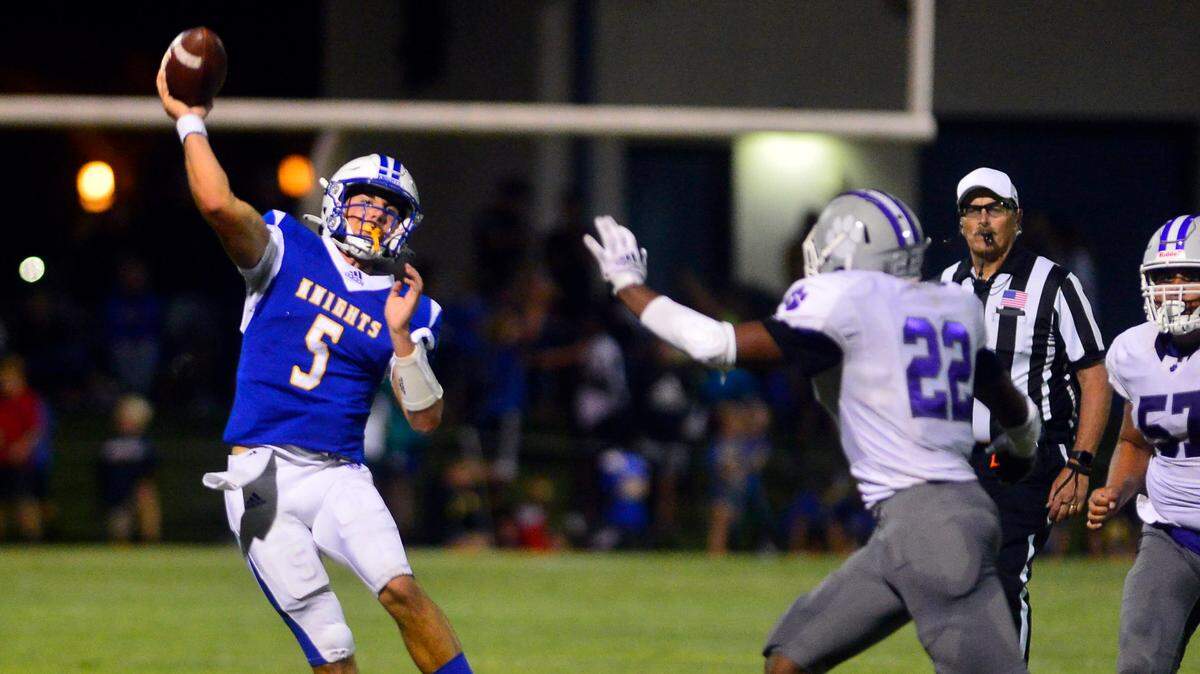 RC quarterback Trey Fasani throws a deep pass during a game between Ripon Christian and Denair at Ripon Christian High School in Ripon California on September 16, 2022.