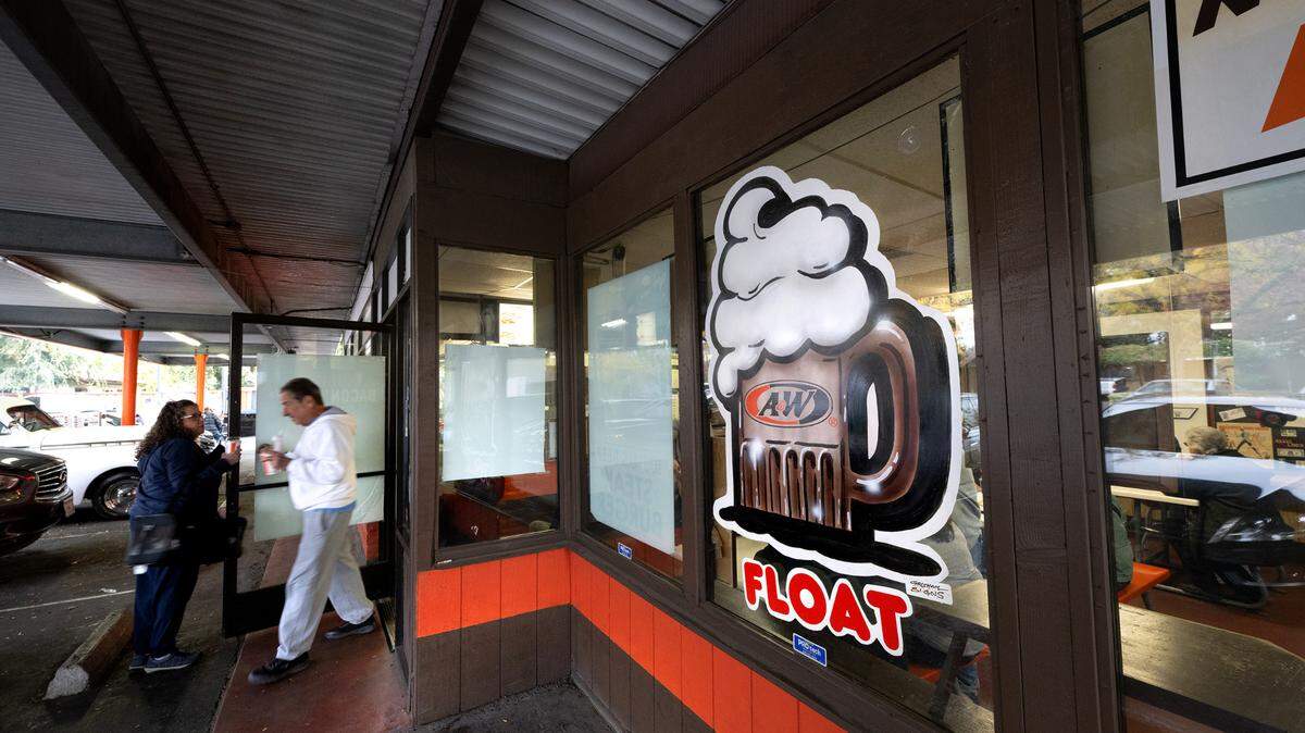 Customers have flocked to A&W restaurant before it closes next week. Photographed in Modesto, Calif., Friday Nov. 17, 2023. The “American Graffiti” era drive-in burger joint is closing after 66 years of continuous service.