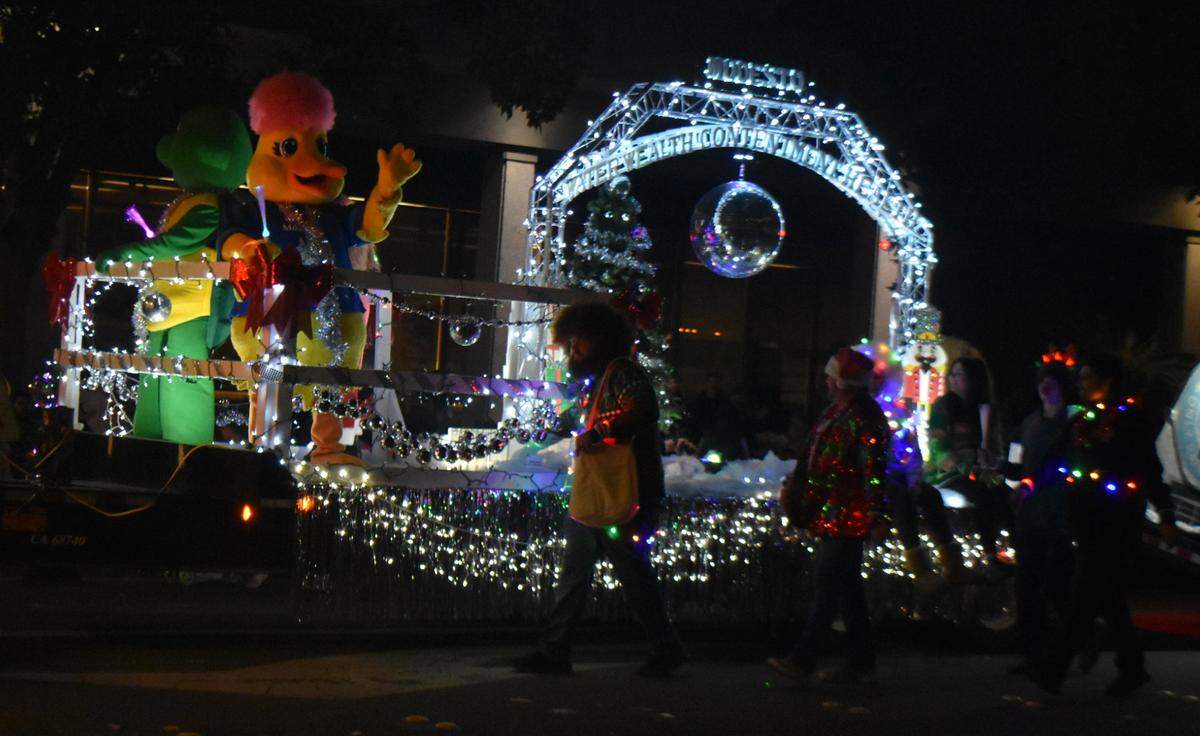 The Modesto Department of Environmental Compliance’s duck mascot was a Disco Duck on Saturday night, Dec. 7, 2024, in the Celebration of Lights Holiday Parade in downtown Modesto.