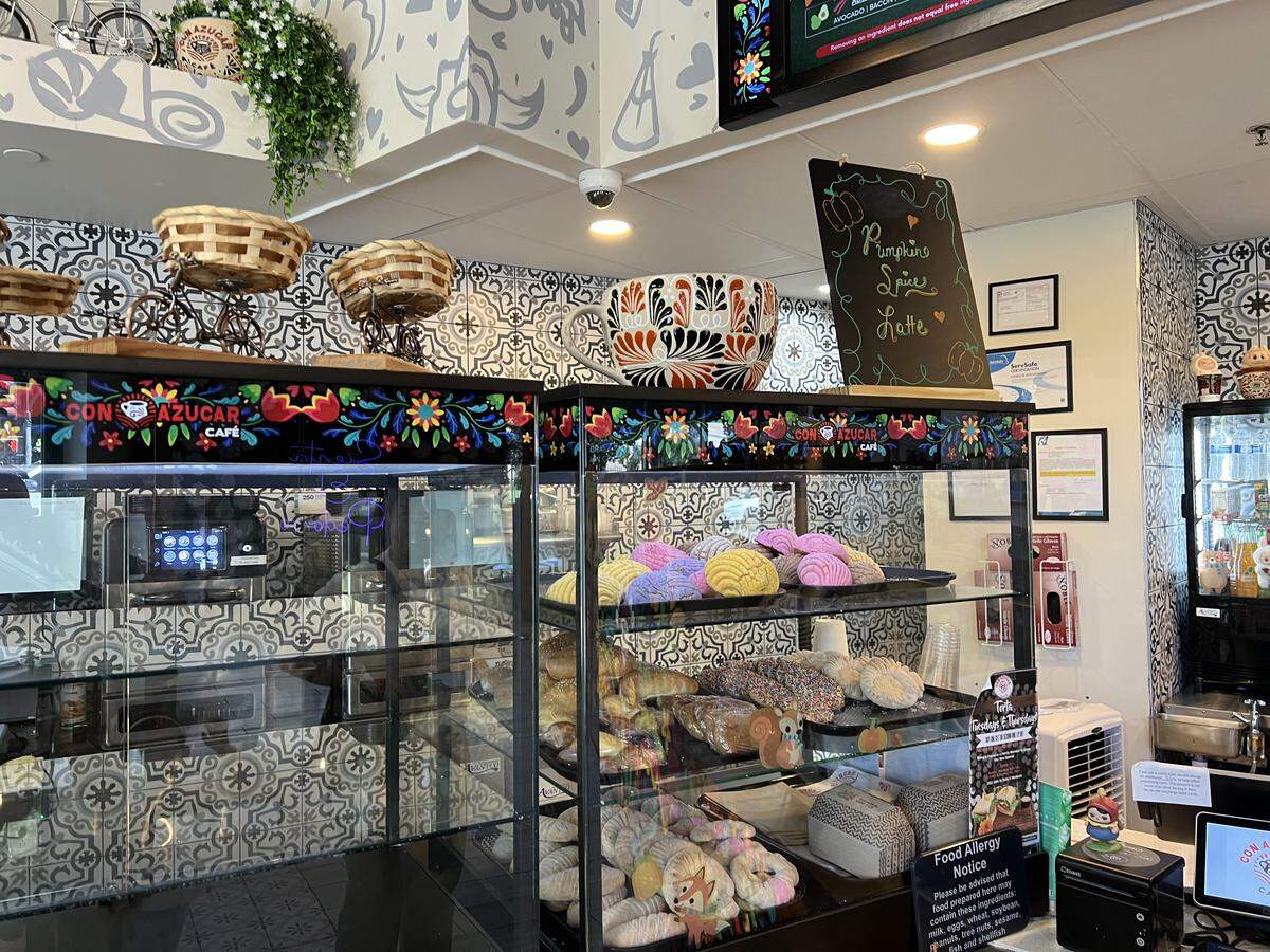 A glass case near the counter was filled with traditional Mexican breads priced at around $2 each at Con Azucar Cafe.
