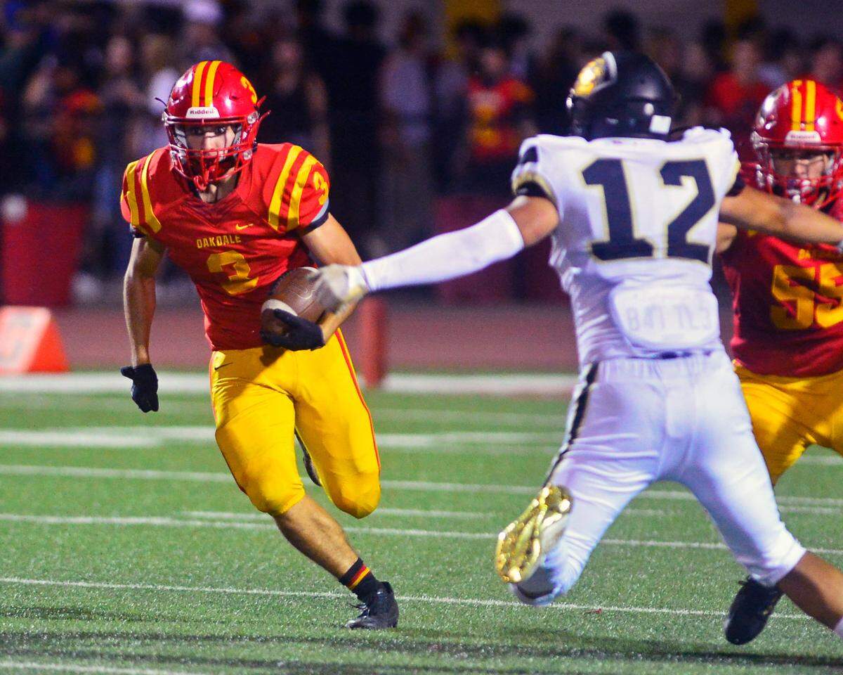 Oakdale running back Jace Rau (3) cuts upfield during a game between Oakdale and Enochs at Oakdale High School in Oakdale CA on September 23, 2022.