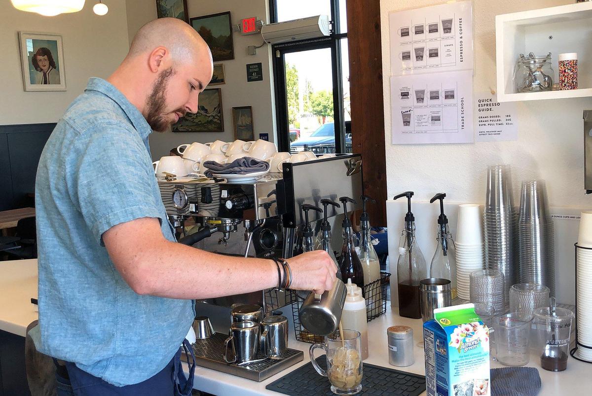 Braxton Jens makes a coffee drink at Austin’s Coffee Crafters in Ripon, Calif. on Friday September 6, 2019.