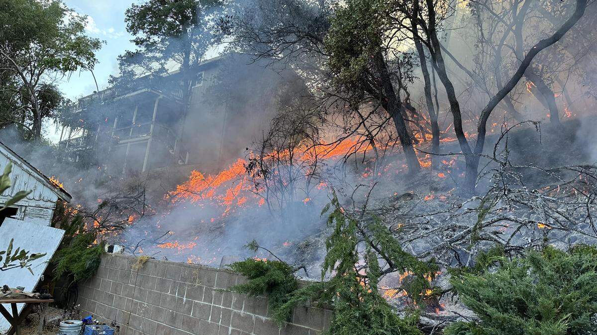 The Sonora Police Department posted on Facebook on Tuesday morning, July 18, 2023, this vegetation fire on the 300 block of Lyons Street. Four homes were evacuated as a precaution.