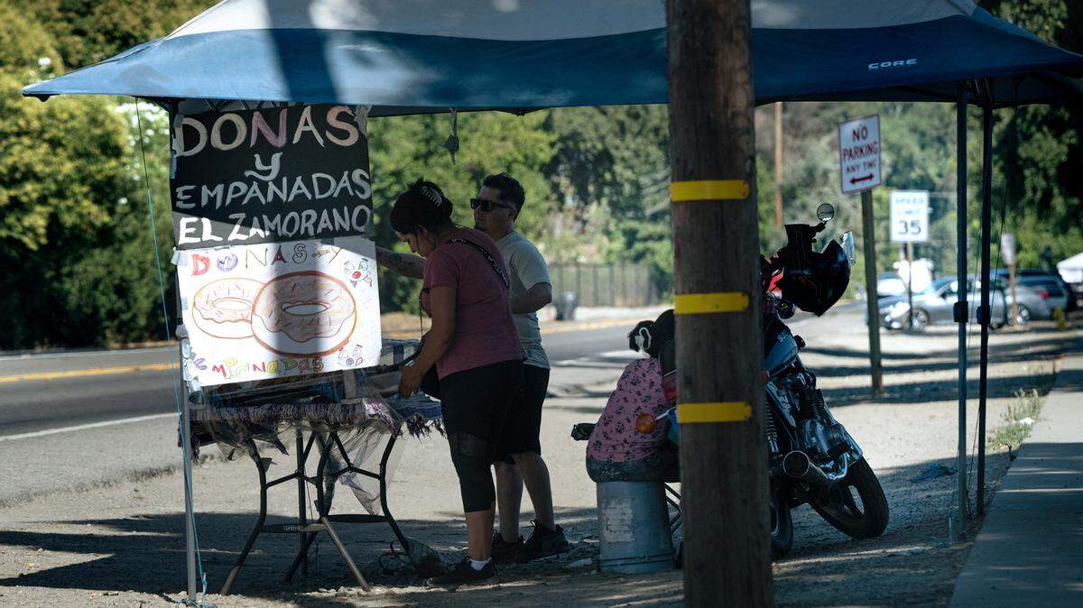 Street vendor on Maze Boulevard in Modesto, Calif., Wednesday, Aug. 7, 2024.